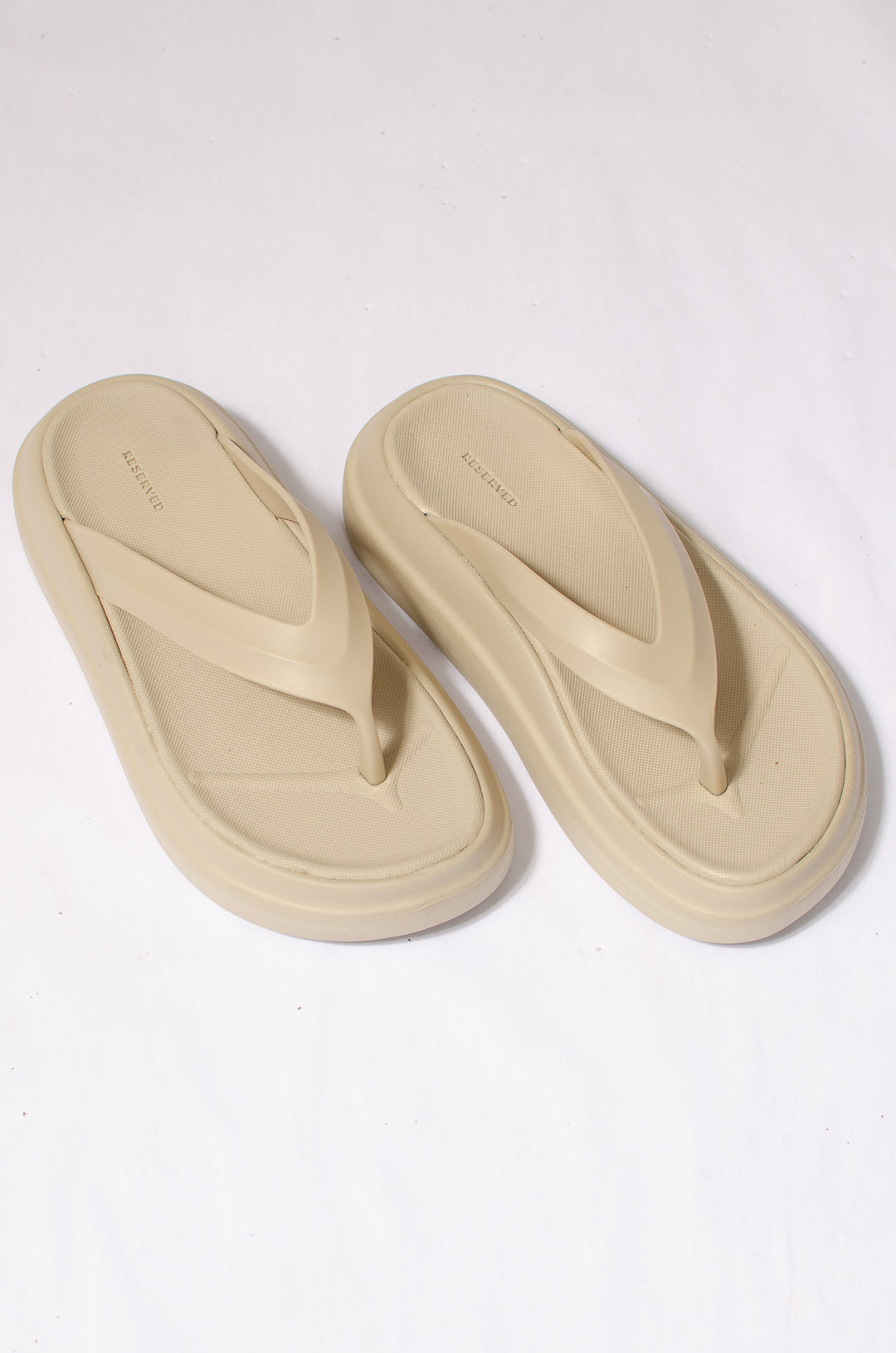 Beige Flip Flops