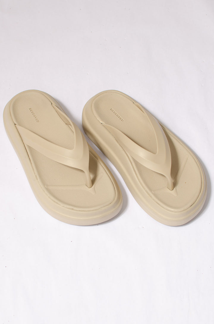 Beige Flip Flops