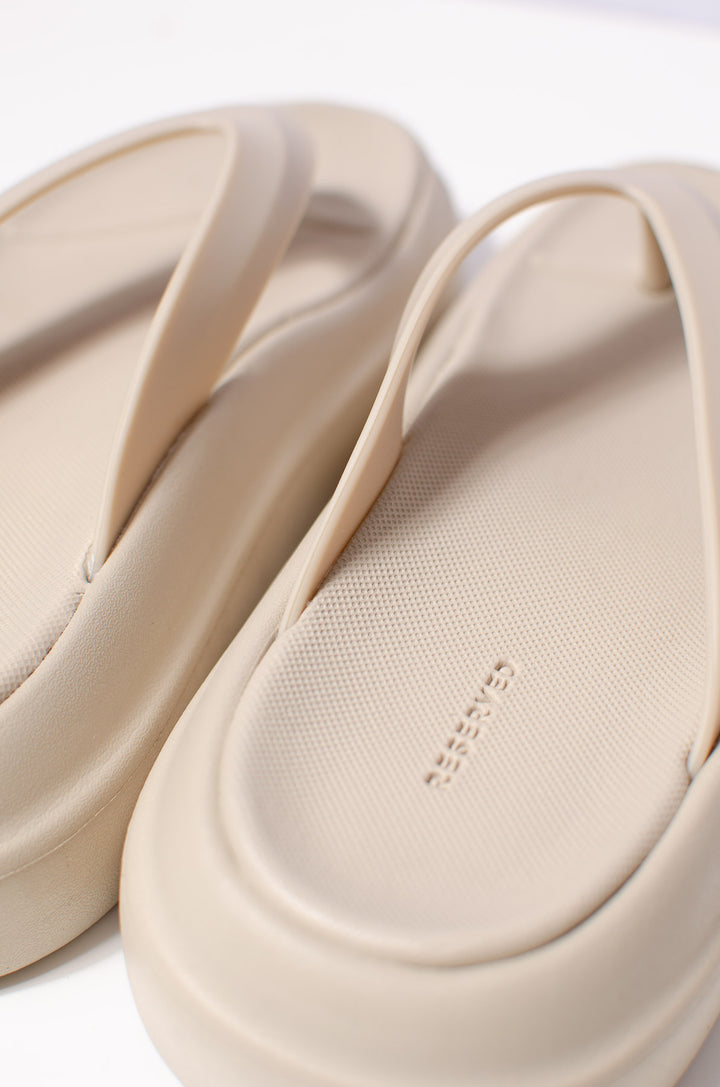 Beige Flip Flops