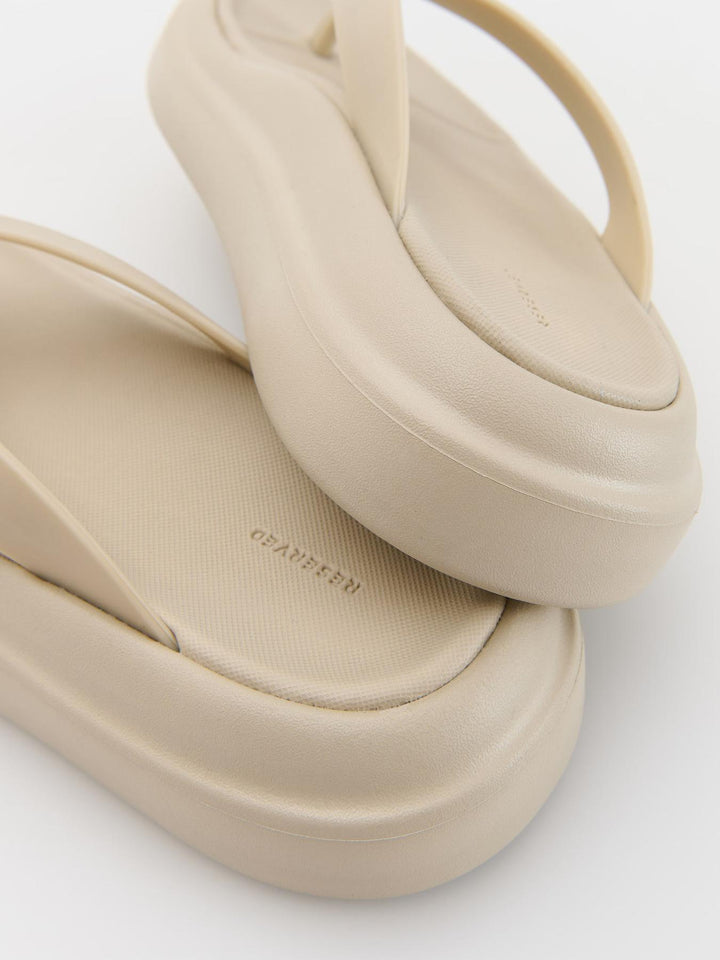 Beige Flip Flops